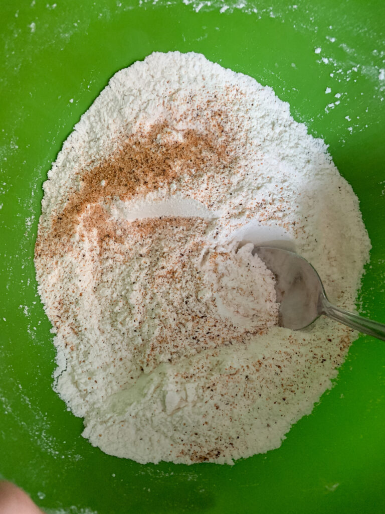 bowl of flour mixture for sausage balls with flour