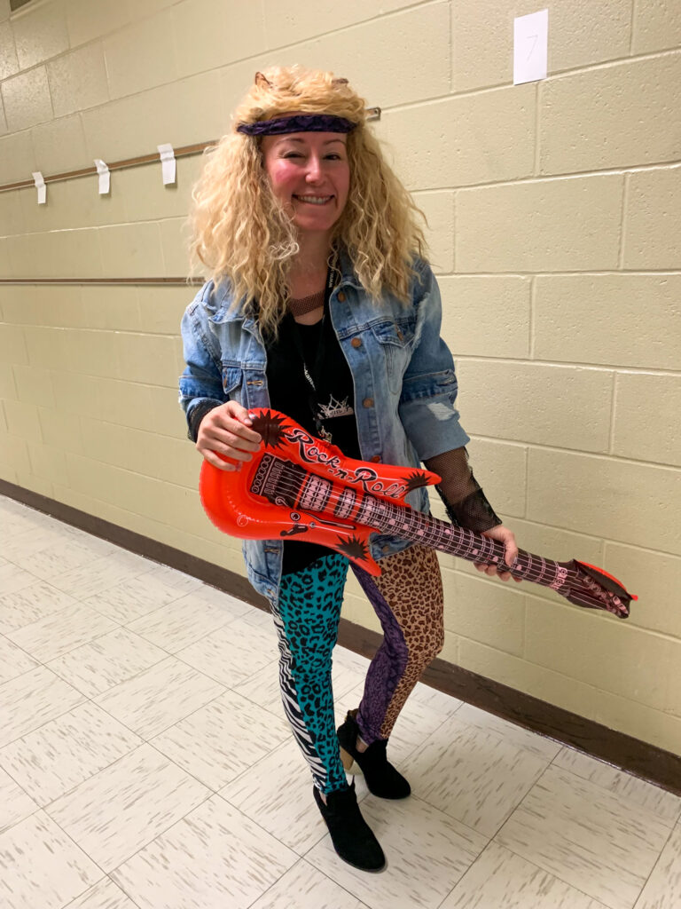teacher dressed up for Rock N Roll day at school for school spirit theme days