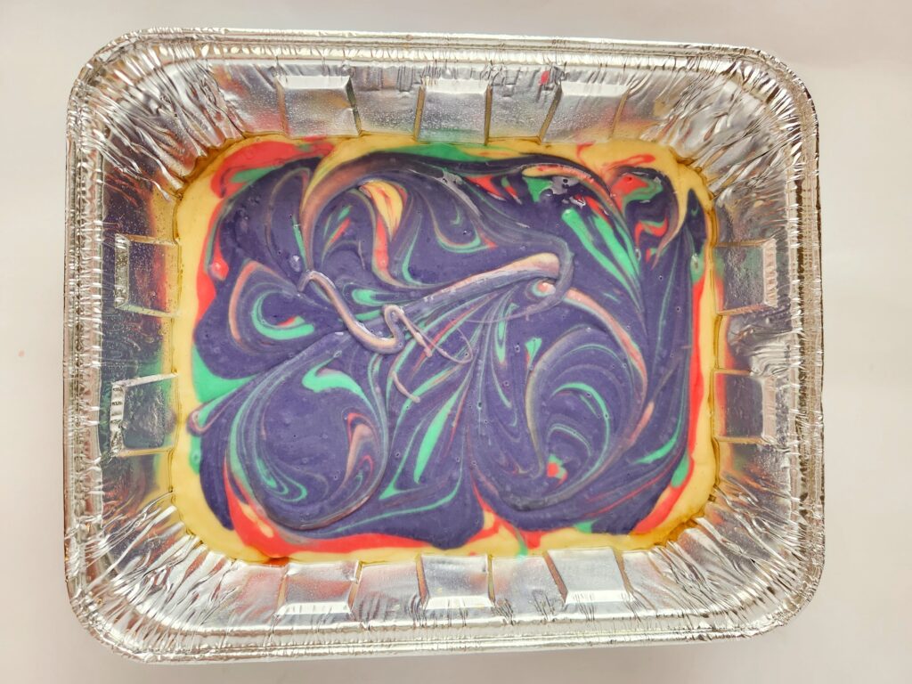swirled batter for cake with food coloring