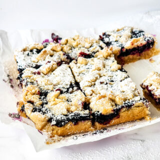lemon blueberry shortbread bars with one missing