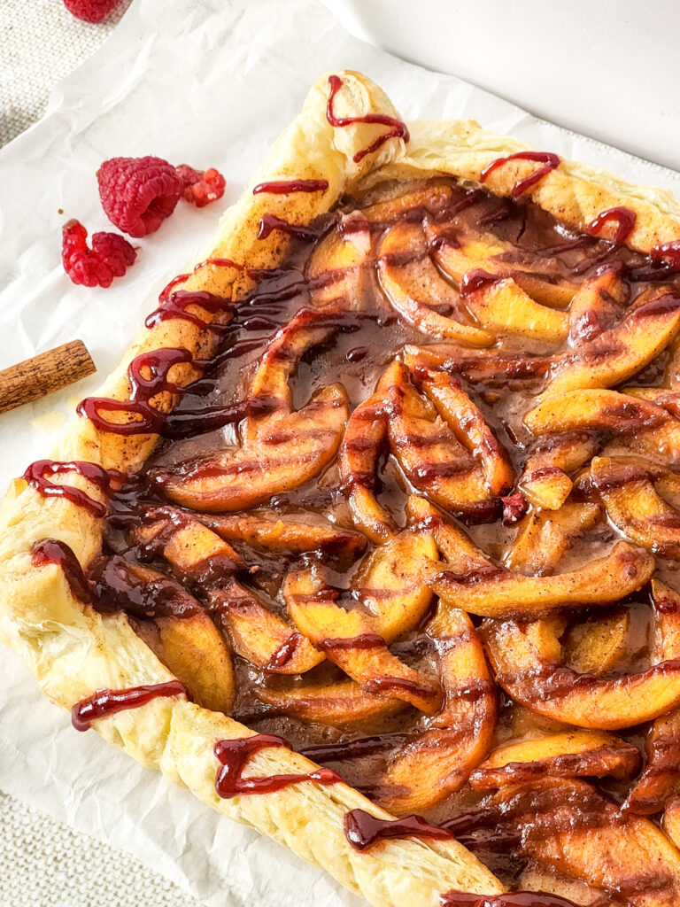 puff pastry fruit tart with peach melba topping