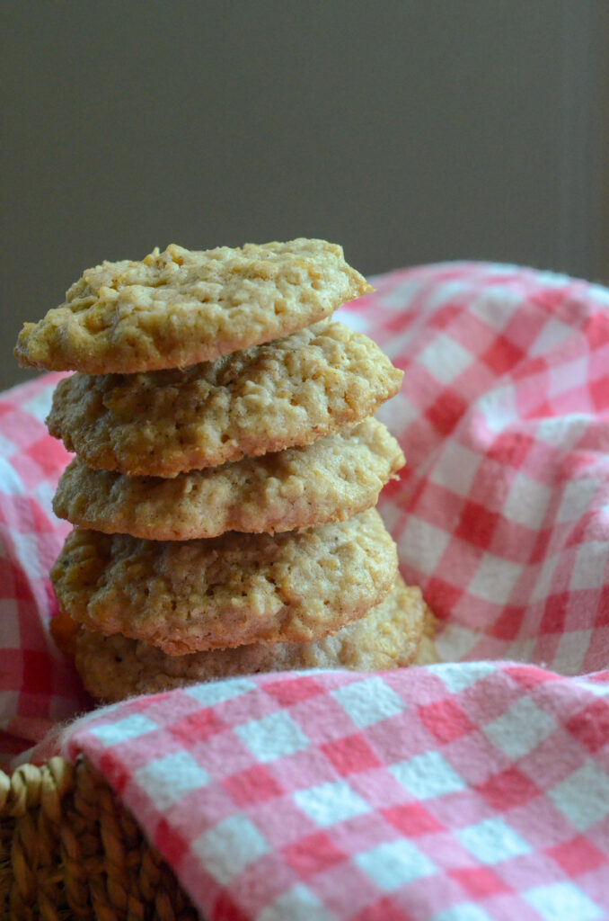 Cinnamon Toast Crunch cookies with oatmeal tall stack on pink and white cloth