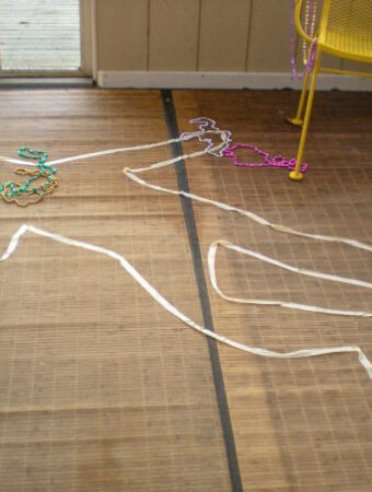 murder mystery box game night decoration of dead body outline on floor