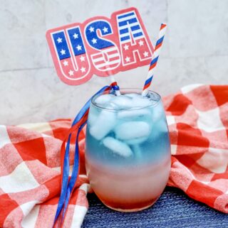 Fourth of July drink with red plaid cloth in back