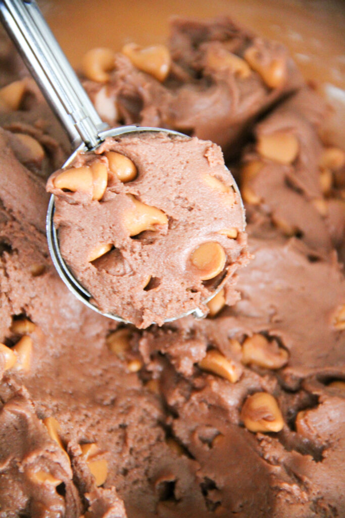 spoon scoop of butterscotch chocolate pudding cookies batter