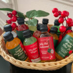 holiday bar cart basket of mini holiday cocktail mixers