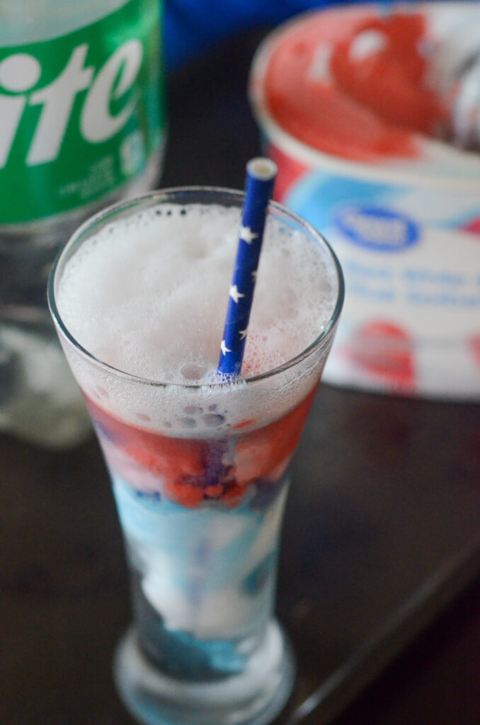 Sprite float in red, white, and blue colors with stars straw