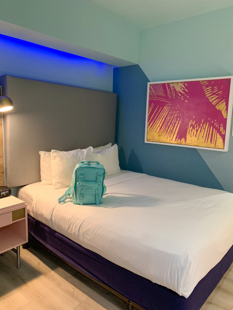 Comfort Inn San Juan room with queen beds and bold artwork