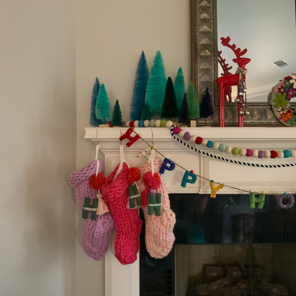 Merry and Bright Christmas decor mantle with Opalhouse knitted stockings