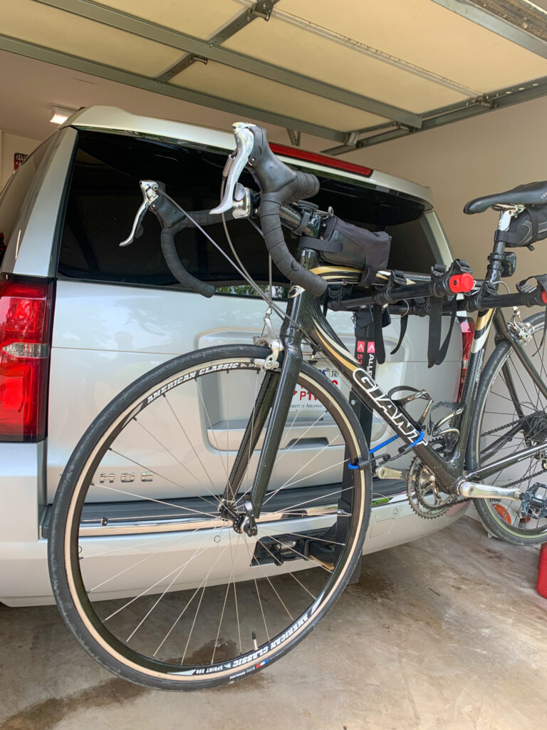 essential cycling gear - a vehicle mounted bike rack - on back of Tahoe