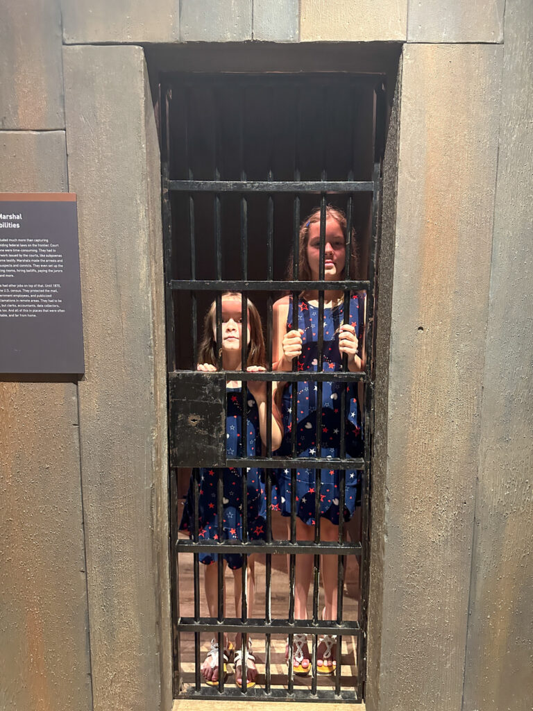 two little girls in jail at United States Marshals Museum exhibit