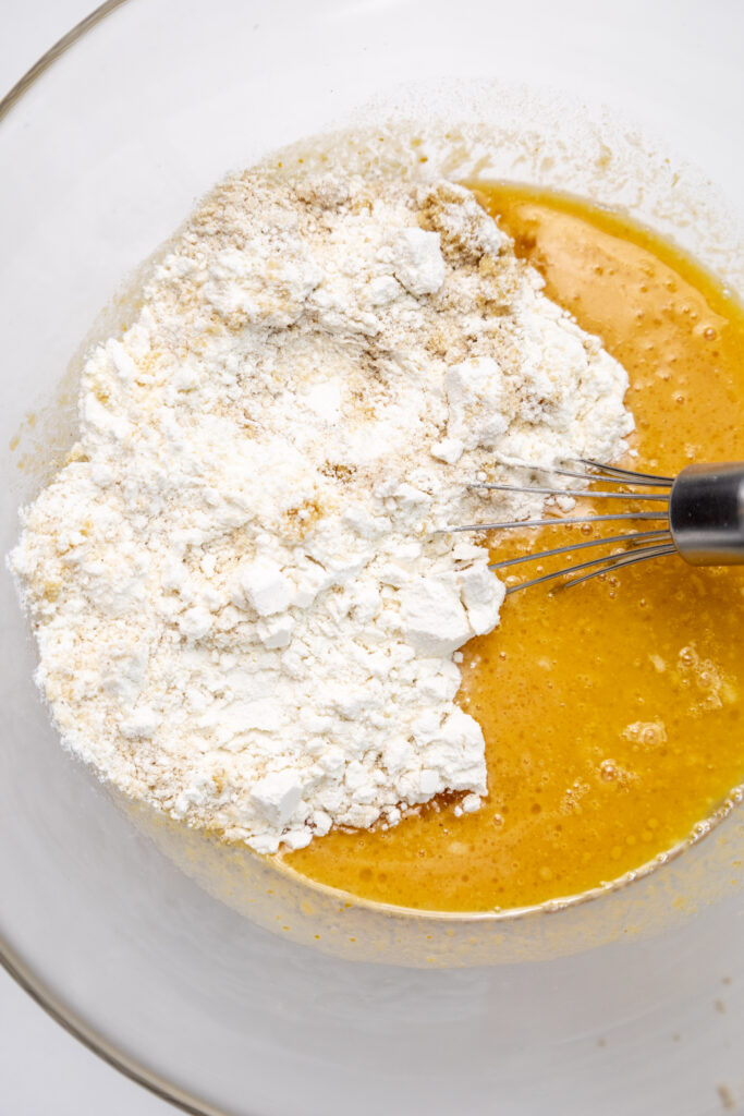 flour and pumpkin mixture whisked in bowl