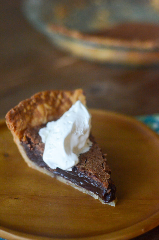 easy chocolate pie on brown wooden plate