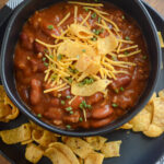 overhead view of slow cooker three bean chili with beef