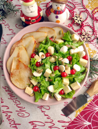 brie pear salad on a Christmas background