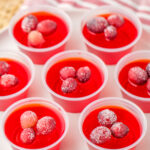 group of Jello cranberry shots in plastic cups