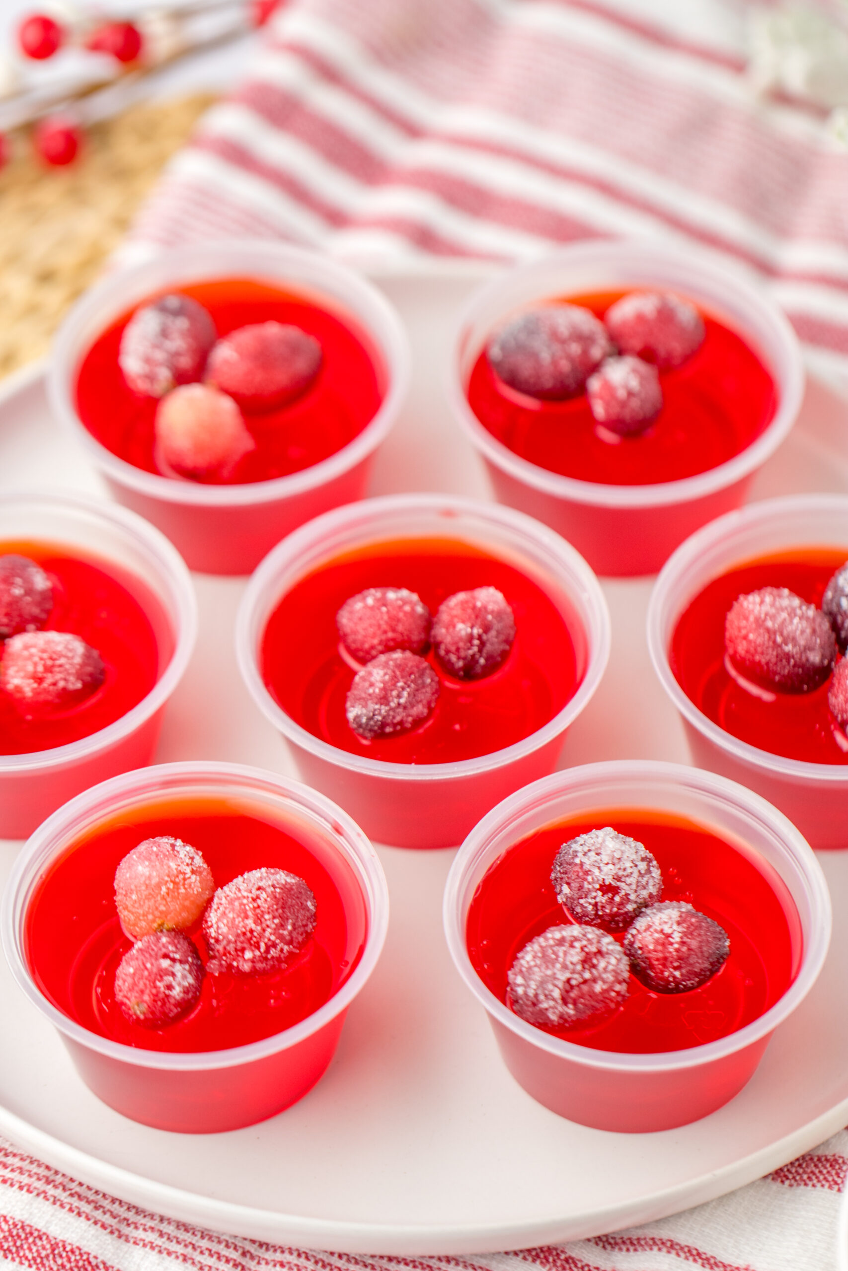 group of Jello cranberry shots in plastic cups