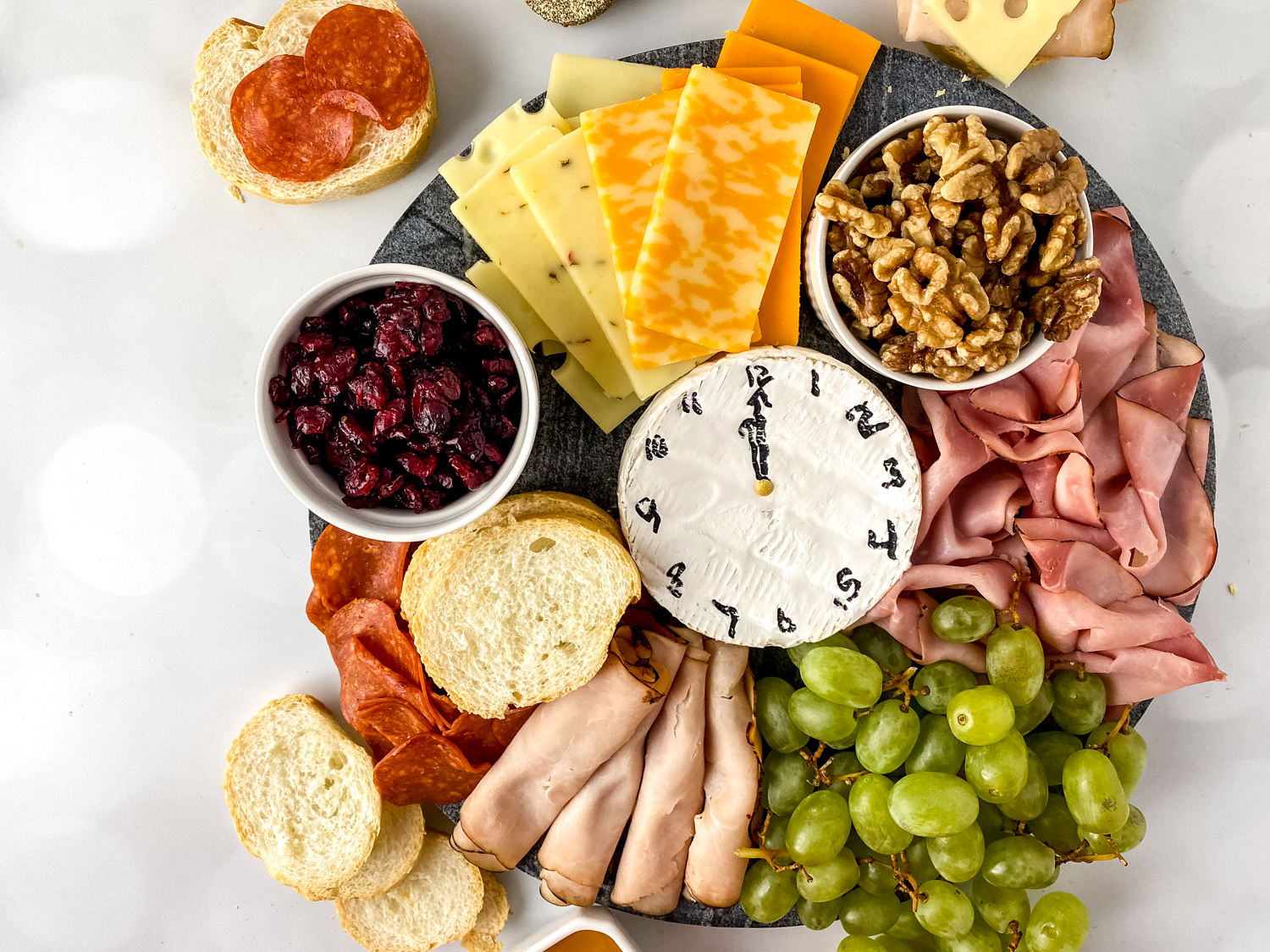 Festive New Year's Charcuterie Board with Cheese Clock