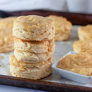 honey butter biscuits on a baking pan