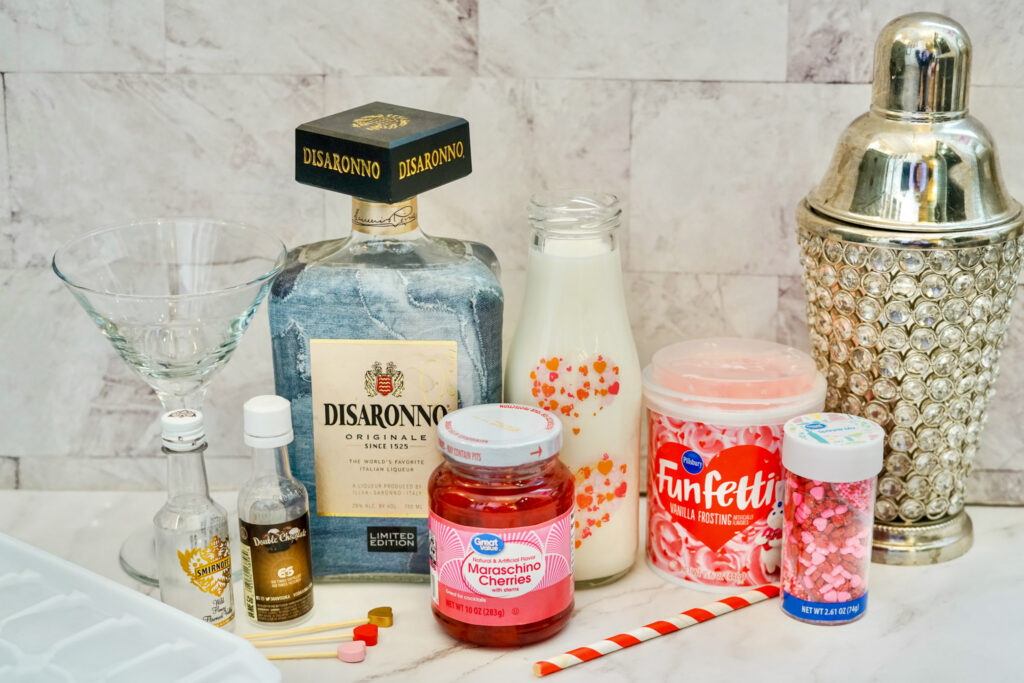 vanilla and chocolate vodkas along with other ingredients on a counter