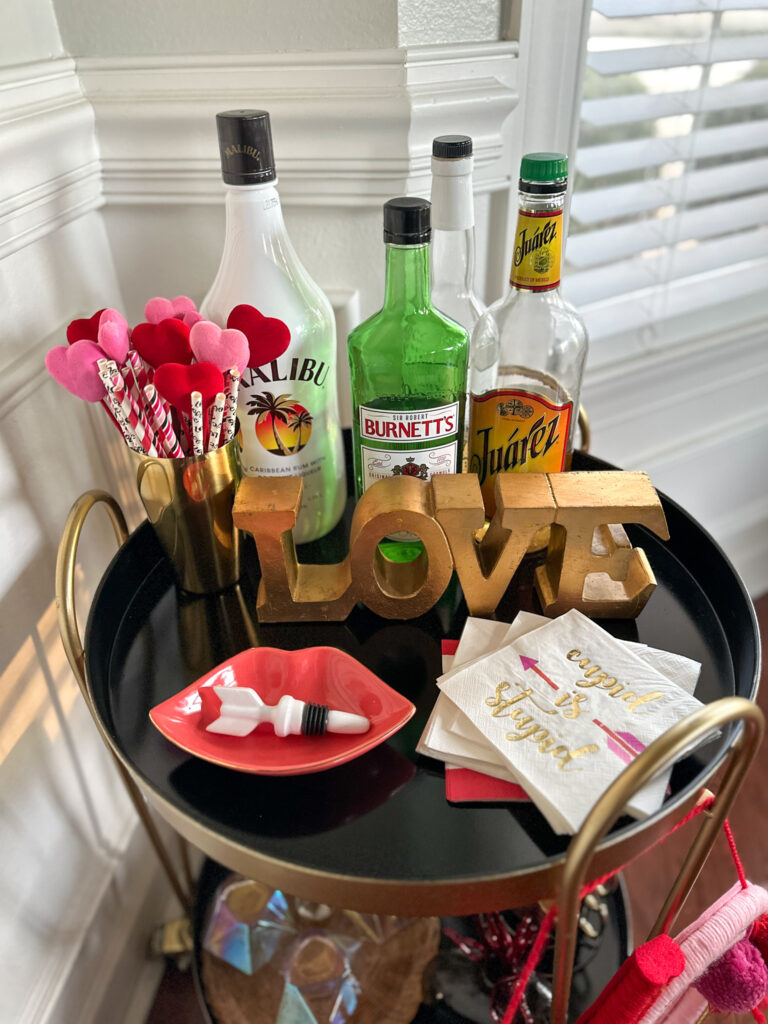 Valentine's Day bar cart with LOVE sign on top