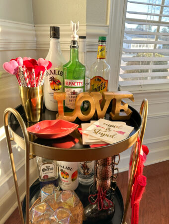 Valentine's Day bar cart in corner of room