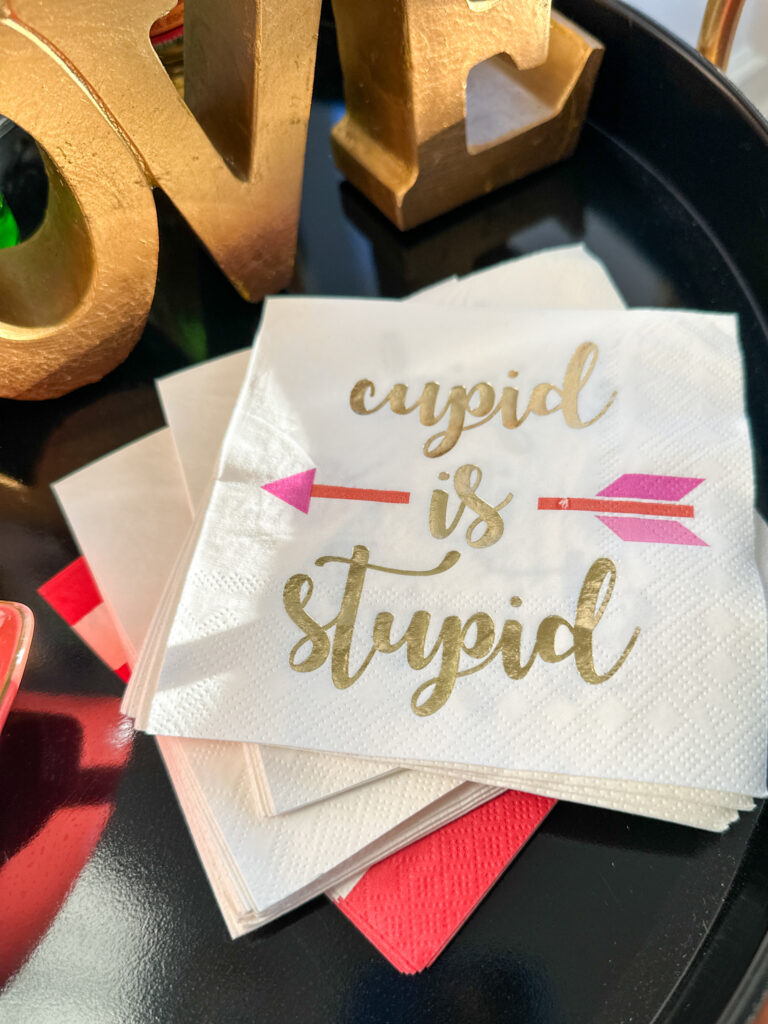 Cupid is Stupid napkins on tray