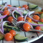 plate of Mediterranean cucumber and tomato salad