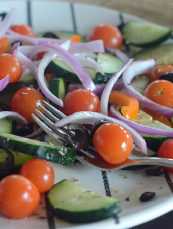 plate of Mediterranean cucumber and tomato salad