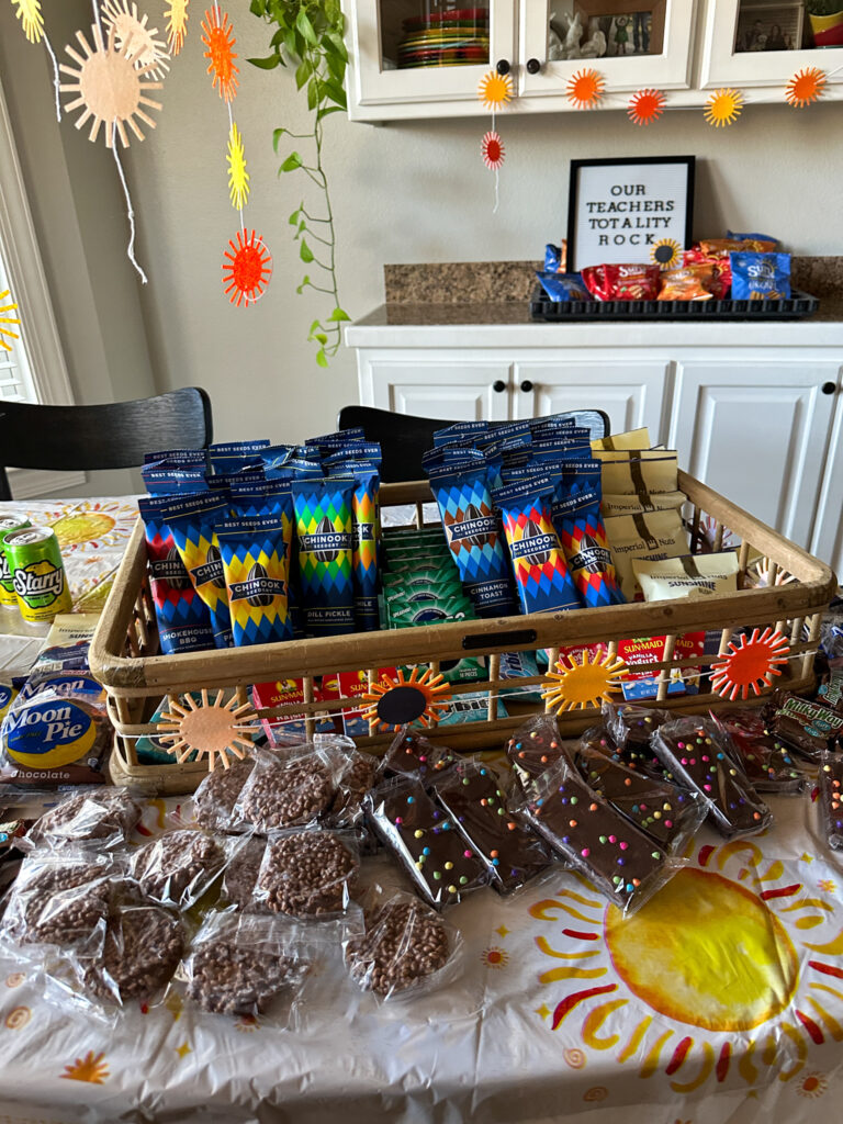 solar eclipse viewing party table with moon and sunshine party snacks
