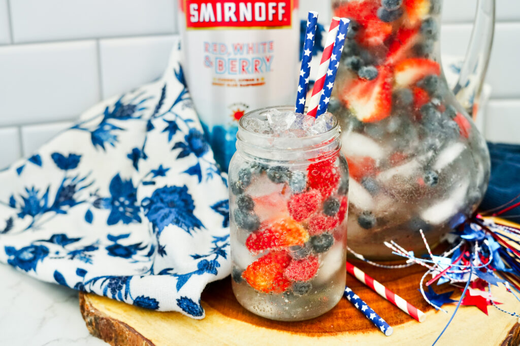 fruity Smirnoff punch for July 4th on wood server