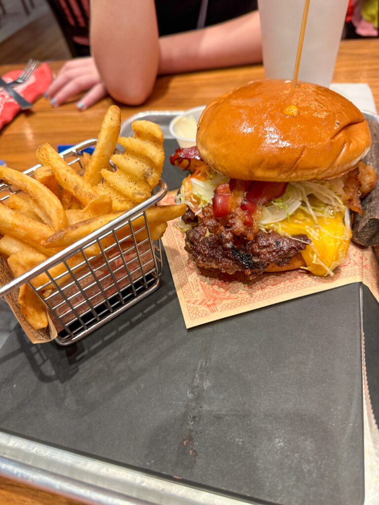 fries trio and burger on tray at Guy Fieri's in Branson Landing