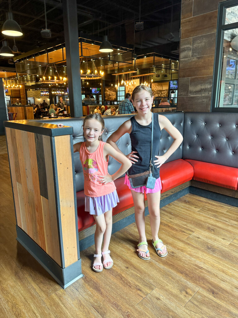 two girls in Guy Fieri's Branson Kitchen + Bar 