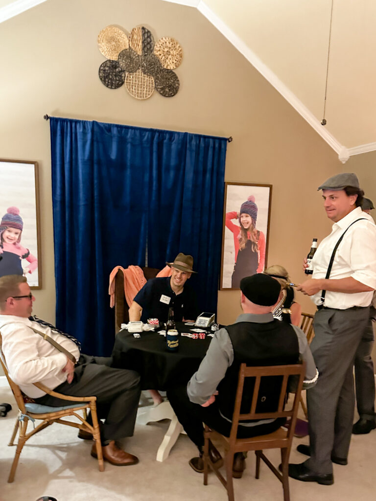 group of men "gambling" in Gatsby murder mystery game