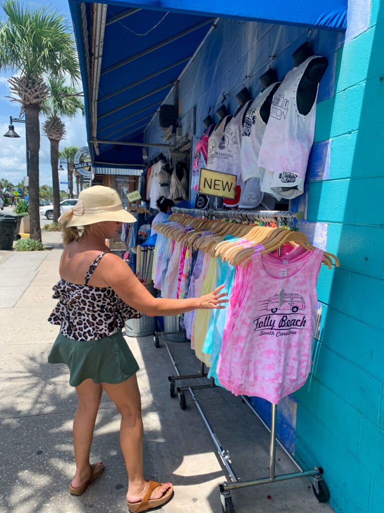 lady checking out t-shirts