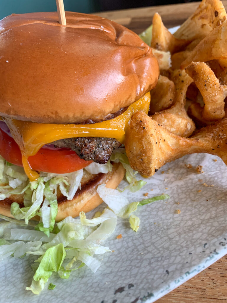 cheeseburger and fries at Rita's Seaside Grille 