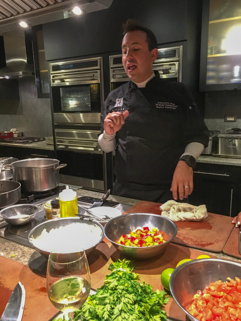 Chef Shahin Afsharian gives cooking instruction during a Savannah cooking class