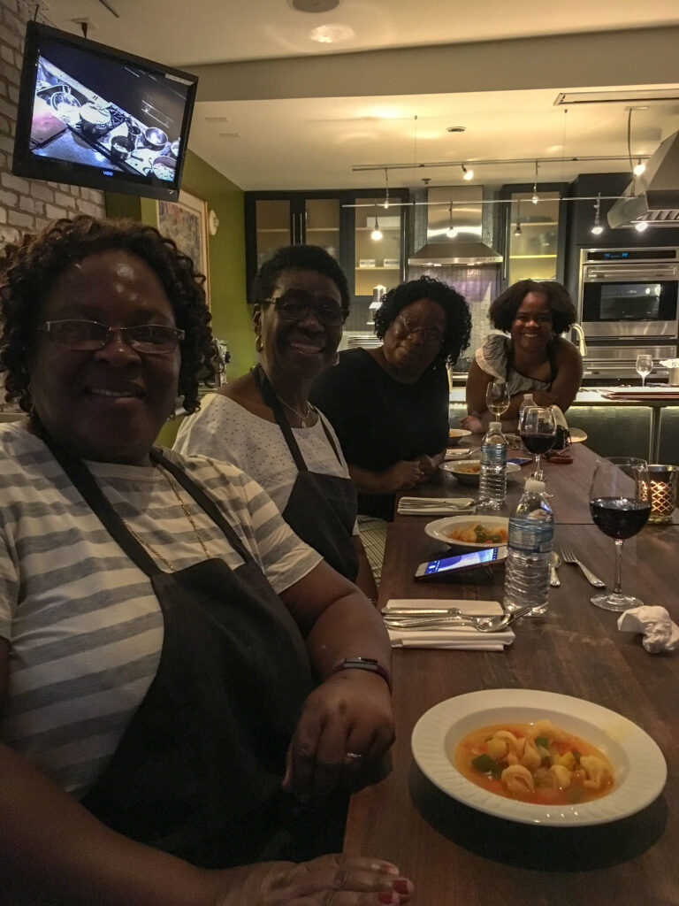 group of ladies attending a Savannah cooking class at what is now Hotel Bardo Savannah