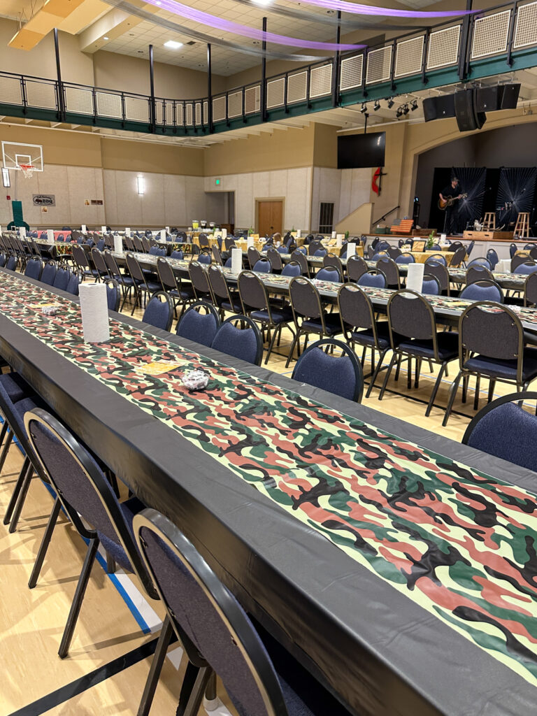 Wild Game Dinner tables set up with camouflage decorations