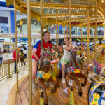 girls on carousel in Albrook Mall