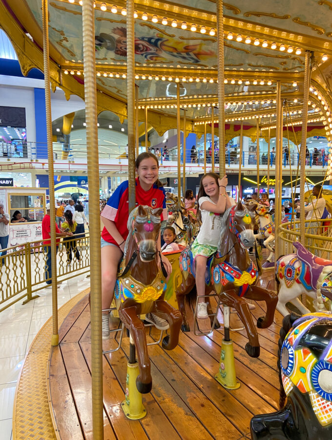 girls on carousel in Albrook Mall