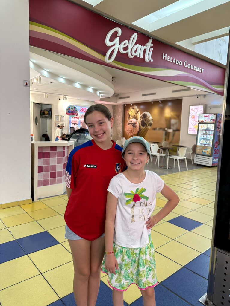 girls stand in front of Gelarti Shop