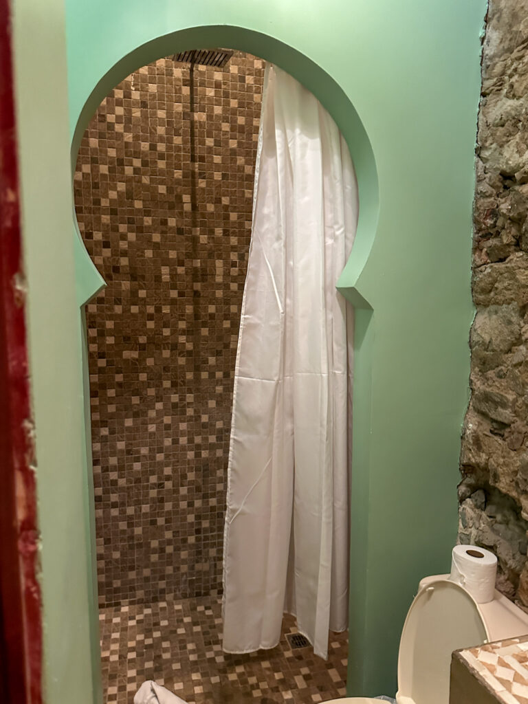 bathroom shower with cut out frame in historic Casco Viejo apartment rental