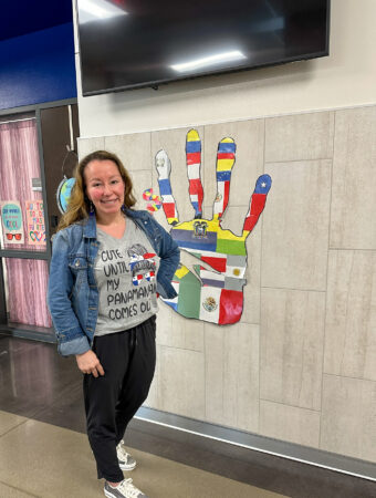 woman poses in Hispanic Heritage Month t-shirt