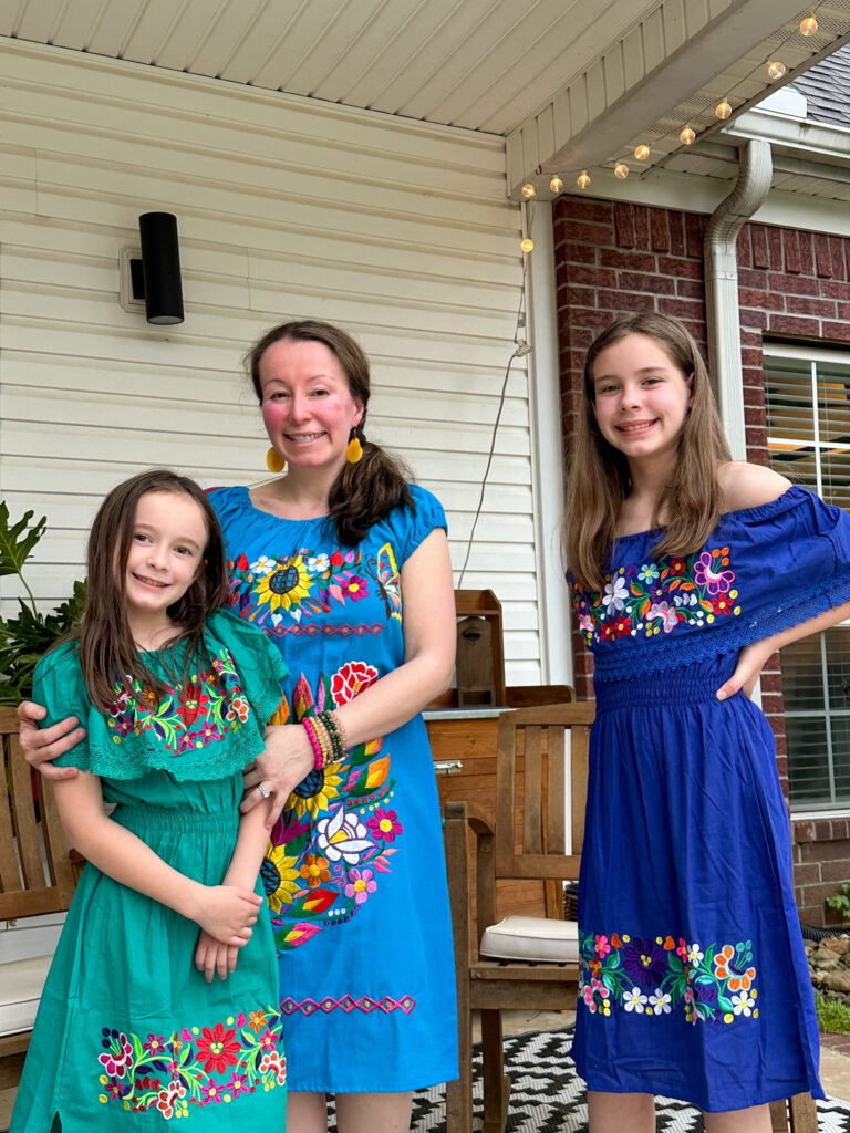 women and daughters wear Mexican embroidered dresses