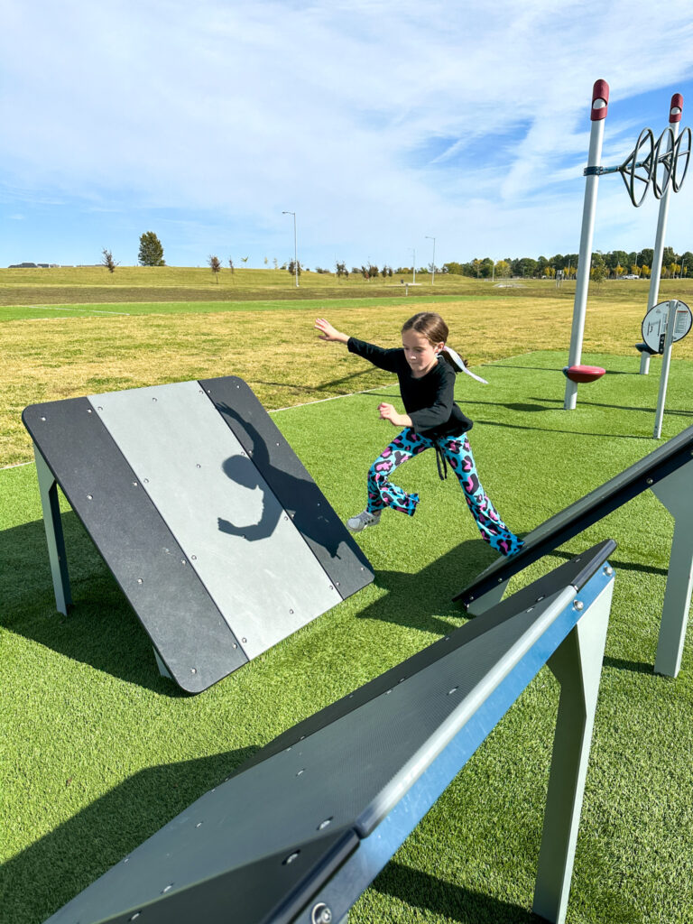 girl plays at Shaw Family Park in Springdale, Arkansas