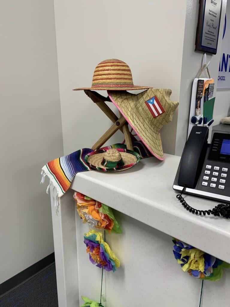 Panama hat and Puerto Rico hat on display on white reception desk