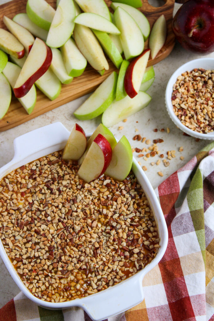 cream cheese caramel apple dip in white bowl