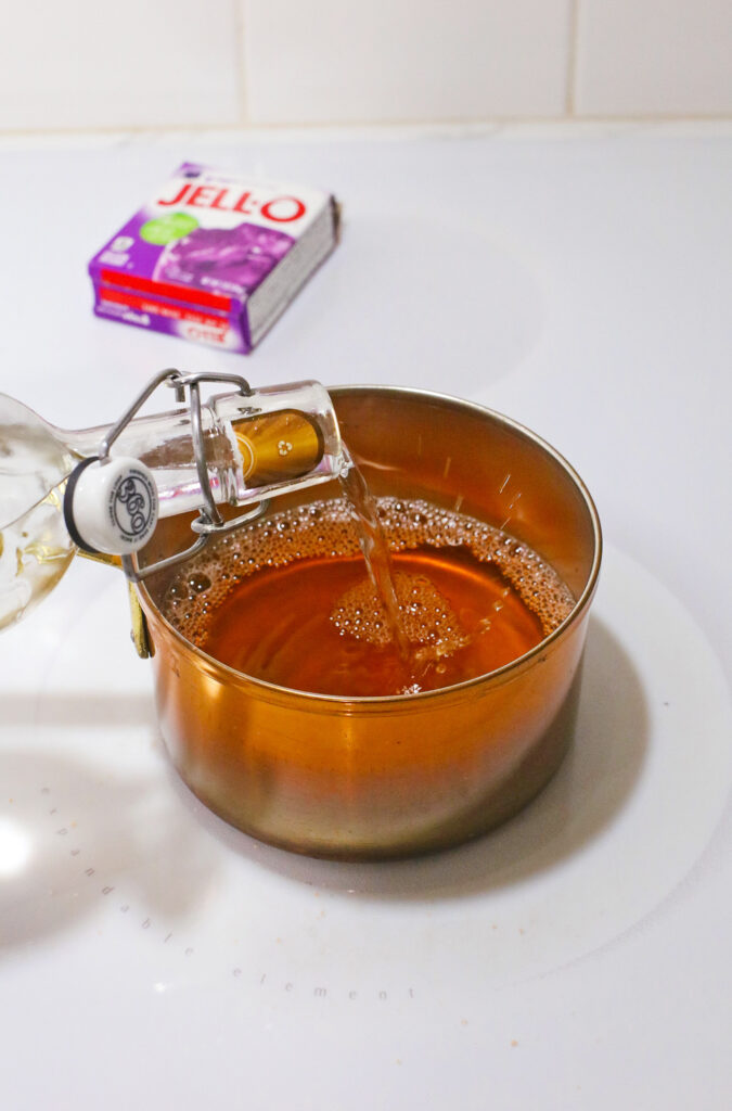 liquid pouring into pot