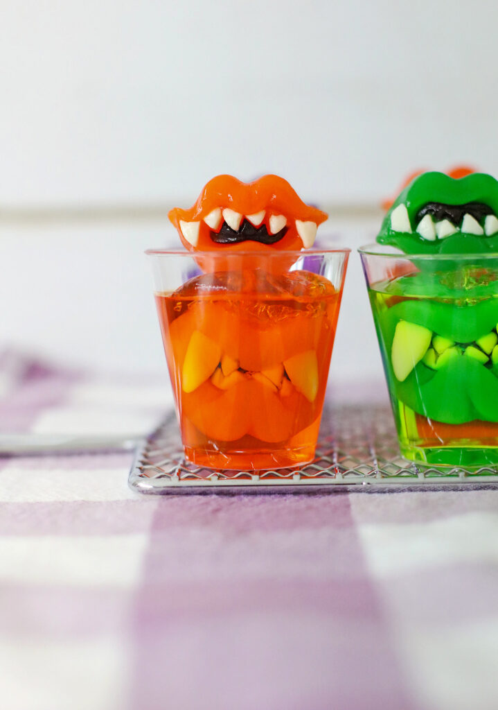 monster teeth Jello shots on purple plaid napkin